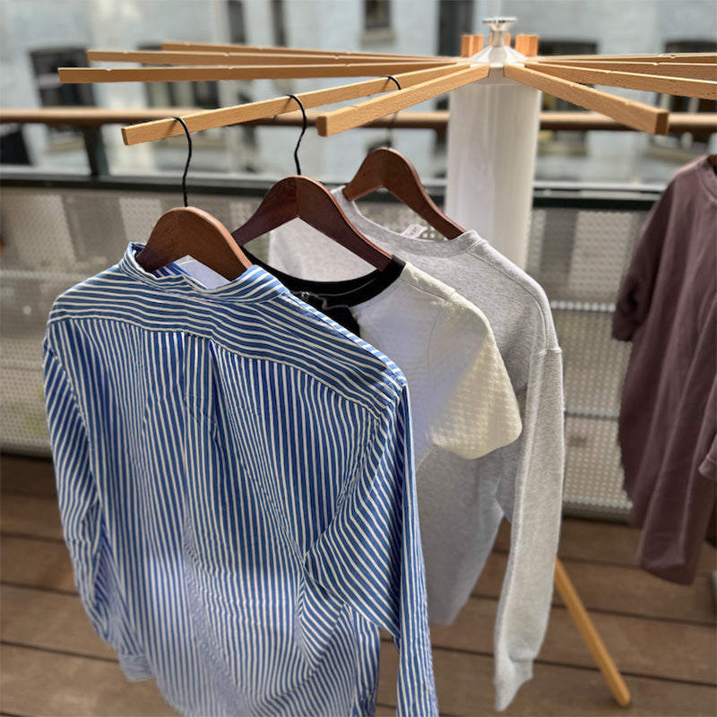 SmartRack drying rack on a balcony with clothes air-drying